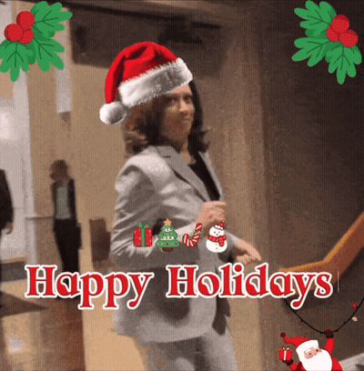 A Picture Of A Woman Wearing A Santa Hat With The Words Happy Holidays GIF