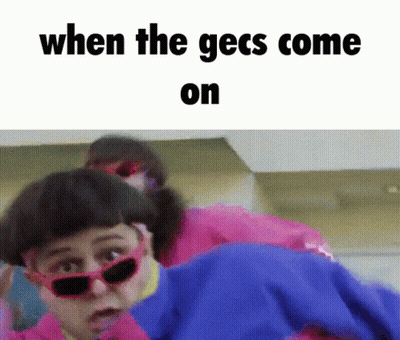 A Picture Of A Woman Wearing Sunglasses With The Words When The Gecs Come On GIF