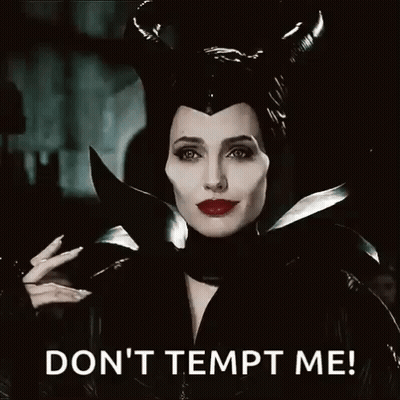 A Picture Of A Woman With Horns And The Words " Don 'T Tempt Me " On The Bottom GIF