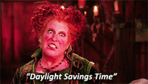 A Picture Of A Woman With Red Hair And The Words Daylight Savings Time GIF