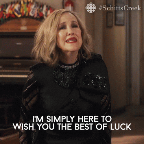 A Picture Of A Woman With The Caption I 'M Simply Here To Wish You The Best Of Luck GIF