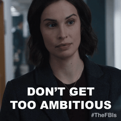 A Picture Of A Woman With The Words " Don 'T Get Too Ambitious " On The Bottom GIF