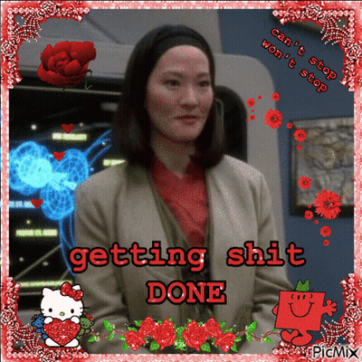 A Picture Of A Woman With The Words " Getting Shit Done " GIF