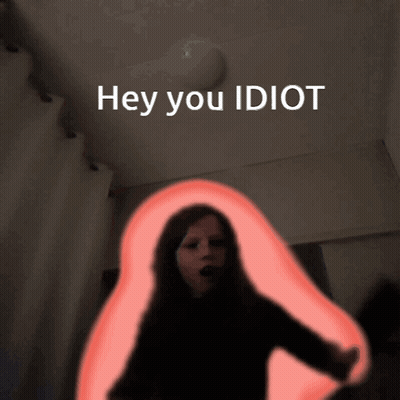 A Picture Of A Woman With The Words Hey You Idiot Written Above Her GIF