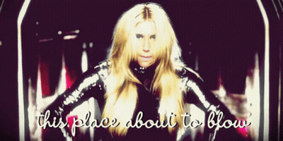 A Picture Of A Woman With The Words " This Place About To Blow " On The Bottom GIF