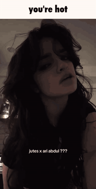 A Picture Of A Woman With The Words You 'Re Hot Jutes X Ari Abdul GIF