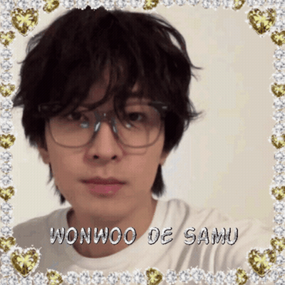 A Picture Of A Young Man With Glasses And The Name Wonwoo De Samu On The Bottom GIF