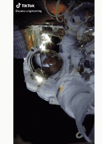 A Picture Of An Astronaut Floating In Space With Tiktok Written On The Bottom Right GIF