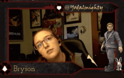 A Picture Of Bryson With A Gremlins Poster Behind Him GIF
