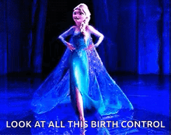 A Picture Of Elsa From Frozen Dancing On A Stage GIF