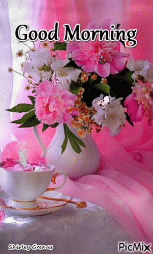 A Picture Of Flowers And A Cup Of Coffee With The Words Good Morning On It GIF