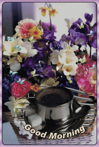 A Picture Of Flowers And A Cup Of Coffee With The Words " Good Morning " GIF