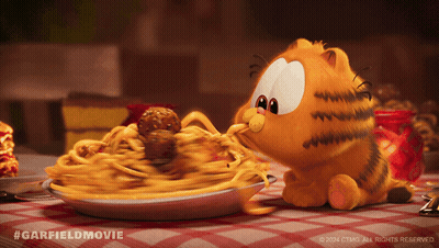 A Picture Of Garfield Eating Spaghetti And Meatballs From A Plate GIF