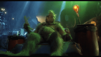 A Picture Of Grinch Reading A Book With The Words On Such Short Notice Above Him GIF