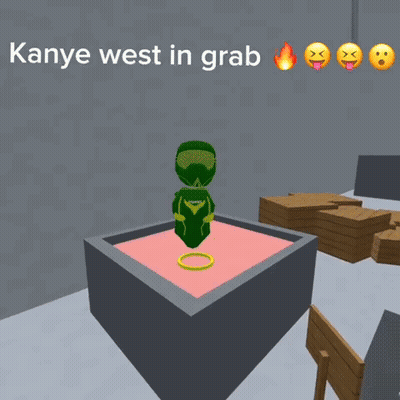 A Picture Of Kanye West In Grab With Flames And Smiley Faces GIF