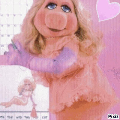 A Picture Of Miss Piggy With A Calendar In The Background GIF
