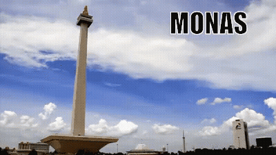 A Picture Of Monas With A Tower In The Foreground GIF