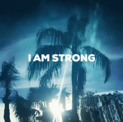 A Picture Of Palm Trees With The Words " I Am Strong " Above Them GIF