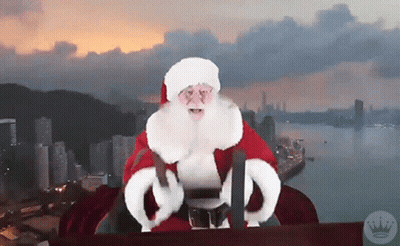 A Picture Of Santa Claus With A Crown On It GIF