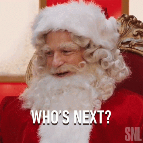 A Picture Of Santa Claus With The Words Who 'S Next Below Him GIF