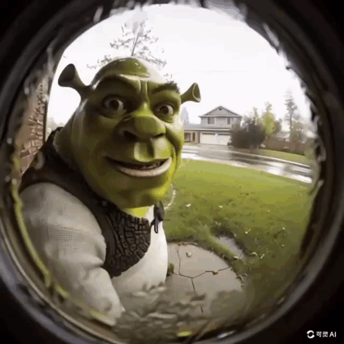 A Picture Of Shrek Looking Through A Doorbell GIF