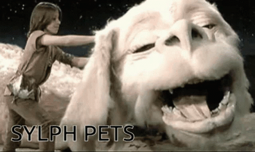 A Picture Of Sylph Pets With A Little Girl And A Large White Dog GIF