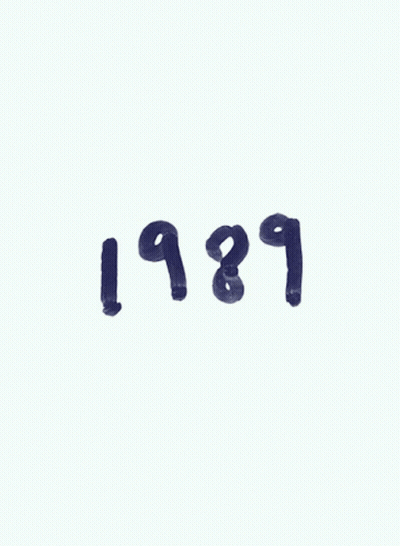 A Picture Of Taylor Swift With The Year 1989 GIF