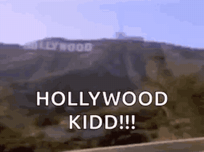 A Picture Of The Hollywood Sign On A Hill With The Words Hollywood Kidd Written On It . GIF