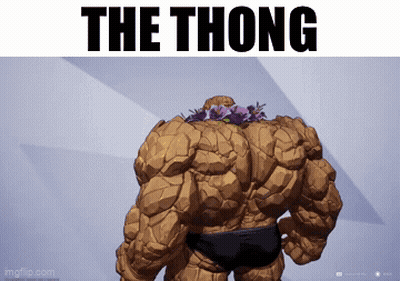 A Picture Of The Thing With Flowers On His Head And The Words The Thong GIF