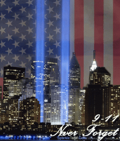 A Picture Of The Twin Towers With The Words Never Forget GIF