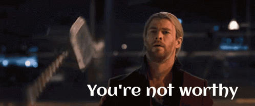 A Picture Of Thor With The Words You 'Re Not Worthy Below Him GIF