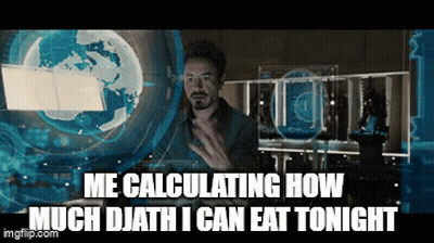 A Picture Of Tony Stark From Iron Man Calculating How Much Djath I Can Eat Tonight . GIF