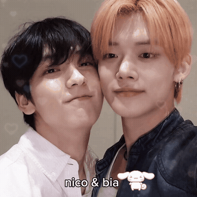 A Picture Of Two Boys With The Caption Nico And Bia GIF
