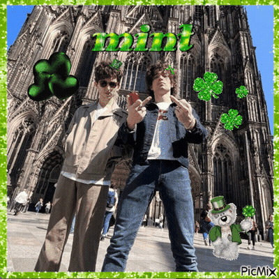 A Picture Of Two Men In Front Of A Cathedral With The Word Mint Written Above Them GIF