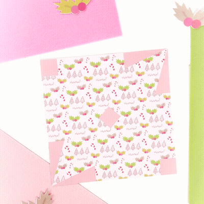 A Piece Of Paper With A Pattern Of Ice Cream Cones And Pineapples On It GIF