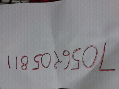 A Piece Of Paper With The Number 75670581 Written In Red GIF
