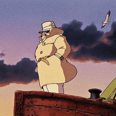A Pig In A Trench Coat And Hat Stands On A Boat GIF
