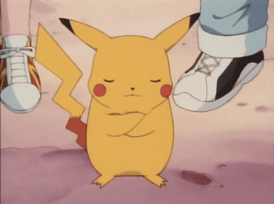A Pikachu With Its Eyes Closed Is Standing Next To A Person 'S Foot GIF