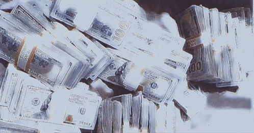 A Pile Of 100 Dollar Bills On Top Of Each Other GIF