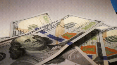A Pile Of 100 Dollar Bills With A Picture Of Benjamin Franklin GIF