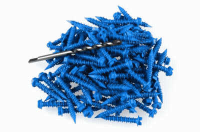 A Pile Of Blue Screws And A Drill GIF