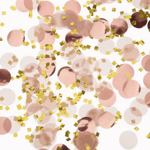 A Pile Of Pink And Gold Confetti Against A White Background GIF