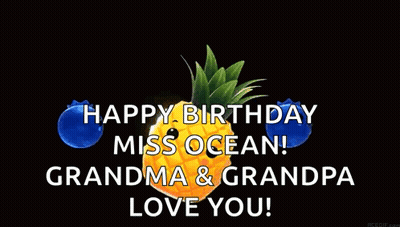 A Pineapple Is Surrounded By Blueberries And Says Happy Birthday Miss Ocean Grandma And Grandpa Love You . GIF
