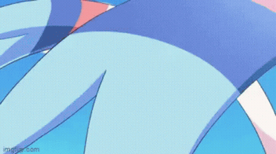 A Pink And Blue Pokemon Is Standing In A Field Of Flowers . GIF