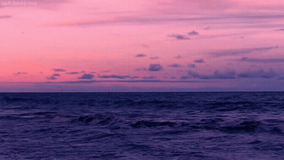 A Pink And Purple Sunset Over The Ocean With A Tumblr.com Link GIF