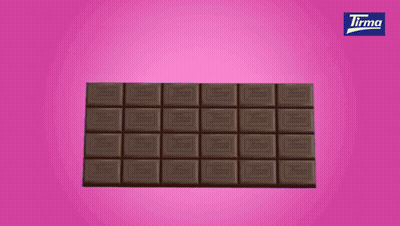 A Pink Background With A Bar Of Tirma Chocolate In The Foreground GIF