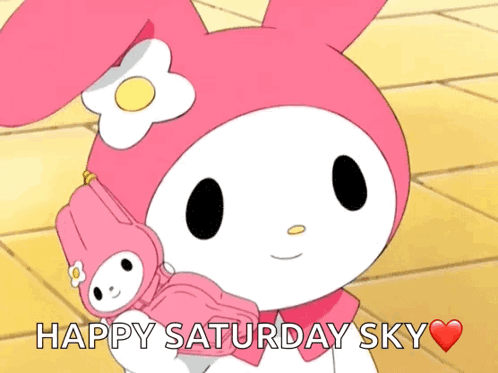 A Pink Bunny With A Flower On Her Head Is Holding A Stuffed Animal With The Words Happy Saturday Sky Above Her GIF