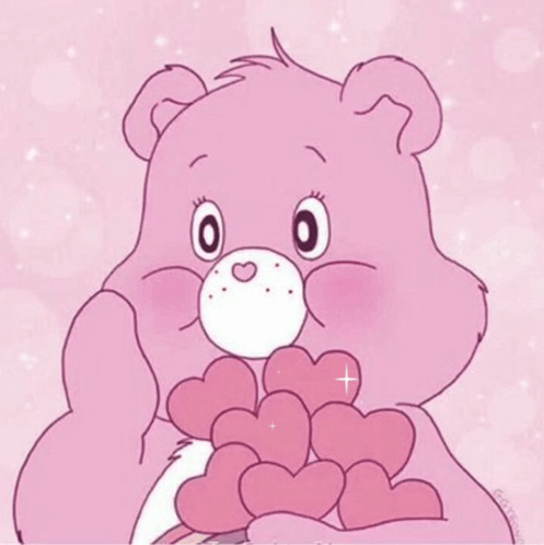 A Pink Care Bear Is Holding A Bunch Of Hearts In Its Paws . GIF