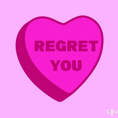 A Pink Heart Shaped Candy That Says Regret You GIF