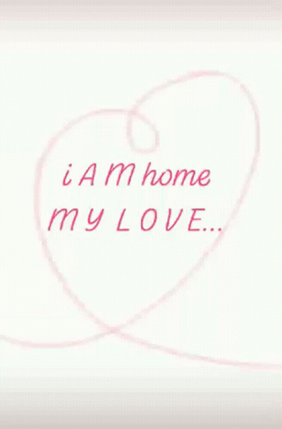 A Pink Heart With The Words I Am Home My Love Written Inside Of It GIF
